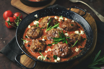 Meatballs in sweet and sour tomato sauce. 