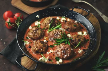 Photo sur Plexiglas Plats de repas Meatballs in sweet and sour tomato sauce. 