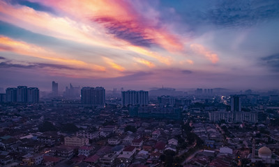 Naklejka na ściany i meble Aerial shot at sunrise of Petaling Jaya, suburb of Kuala Lumpur, Malaysia