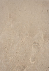 childs foot at beach