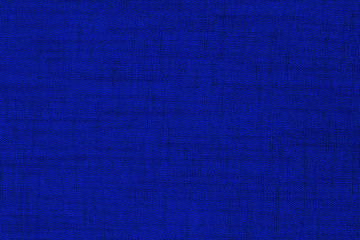 Blue fabric texture background. Empty abstract cloth backdrop