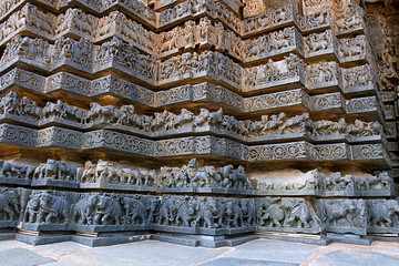 Friezes of animals, scenes from mythological episodes from Ramayana and Mahabharata, at the base of temple, Hoysaleshwara temple, Halebidu, Karnataka