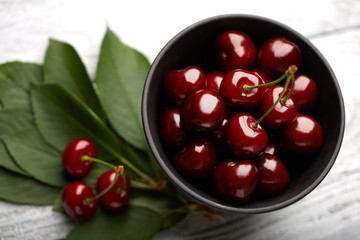 Fresh red cherry on a dark background. Cherries. Healthy food concept.