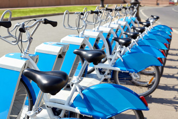 Bicycles in row on the parking lot.