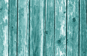 Fototapeta na wymiar Old wooden fence pattern in cyan color.