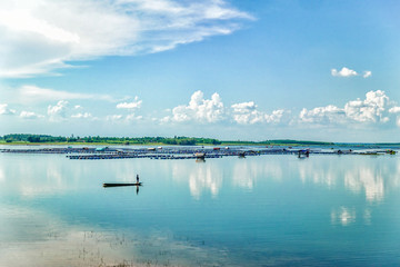 Boat and fisherman landscape view.
