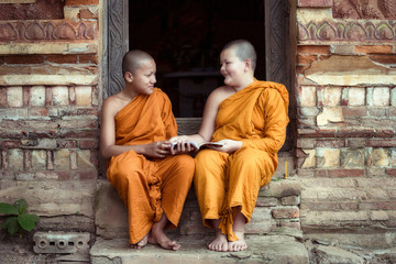 Happiness of Novice monk buddhist religion buddhism in Thailand and Laos.