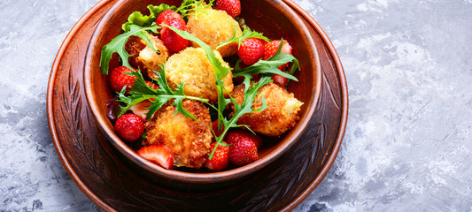 Salad with strawberry and fried cheese