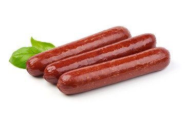 Smoked sausages with fresh herbs, isolated on white background.