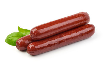 Smoked sausages with fresh herbs, isolated on white background.