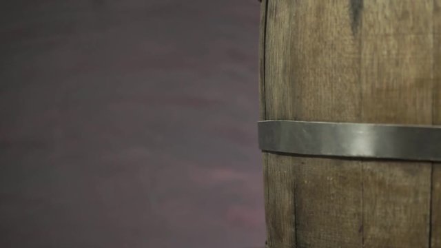 Background of barel on a wooden table, rotation 360 degrees. Beautiful dark background.	