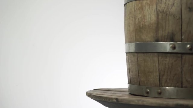 Background of barel on a wooden table, rotation 360 degrees. Beautiful white background.	