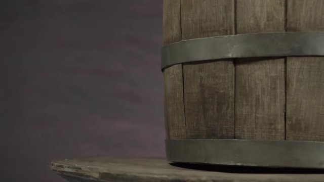 Background of barel on a wooden table, rotation 360 degrees. Beautiful dark background.	