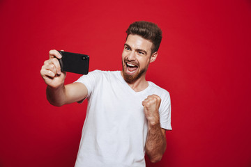 Portrait of a happy young bearded man