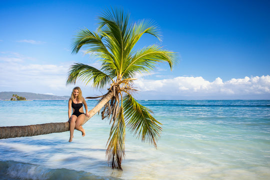 girl on the palm tree