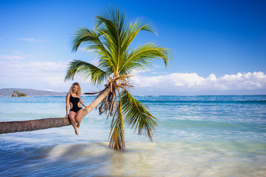 Girl on the palm tree