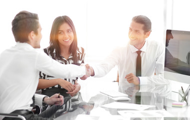 Business people shaking hands, finishing up a meeting