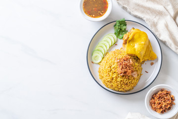 Muslim yellow rice with chicken