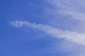 blye sky with white fluffy clouds background
