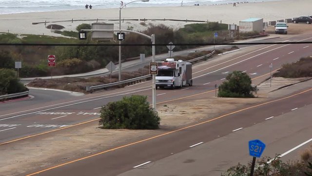 Pan Right to Left: RV Passing Highway of Encinitas