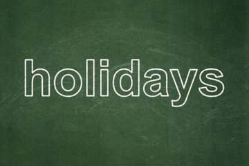 Obraz premium Entertainment, concept: text Holidays on Green chalkboard background