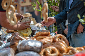 The buyer pays cash to the seller of the goods.