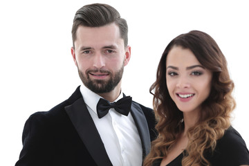 Portrait of a handsome man looking at the camera with a woman