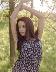 Naklejka premium Woman in a park spring time