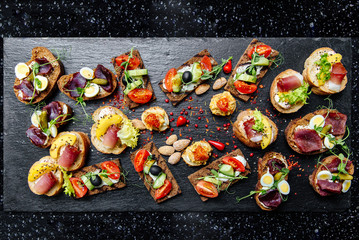 many different types of snacks on the table