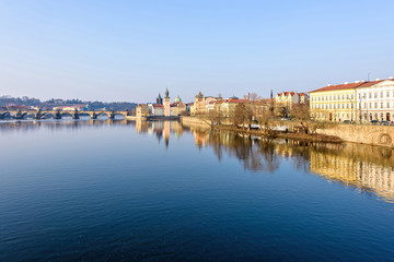 Fototapeta na wymiar Vltava River, Charles Bridge and famous clocktower