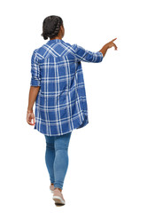Back view of a young black girl in jeans and a checkered shirt.