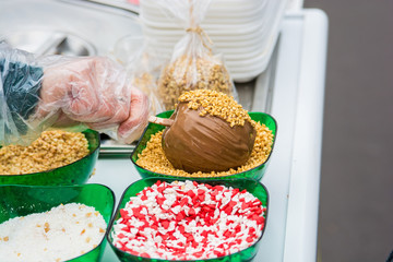 Making chocolate dipped apple