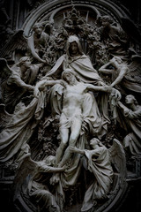 The door of the central entrance of the Duomo Cathedral of Milan with elements of the life of Jesus. 
