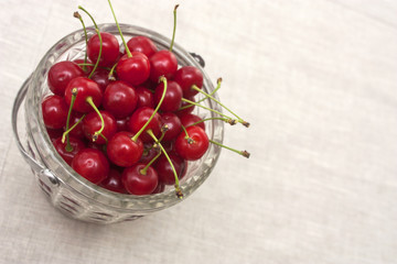 Cherries in a glass pail
