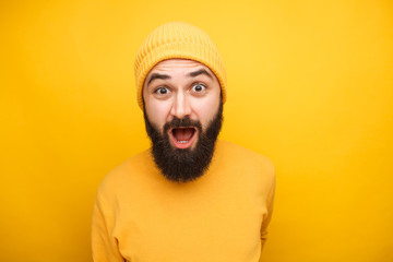 Shocked emotional bearded man