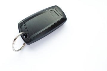 Electronic black car key on white background