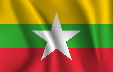 Flag of Myanmar. Realistic waving flag of Republic of the Union of Myanmar. Fabric textured flowing flag of Burma.