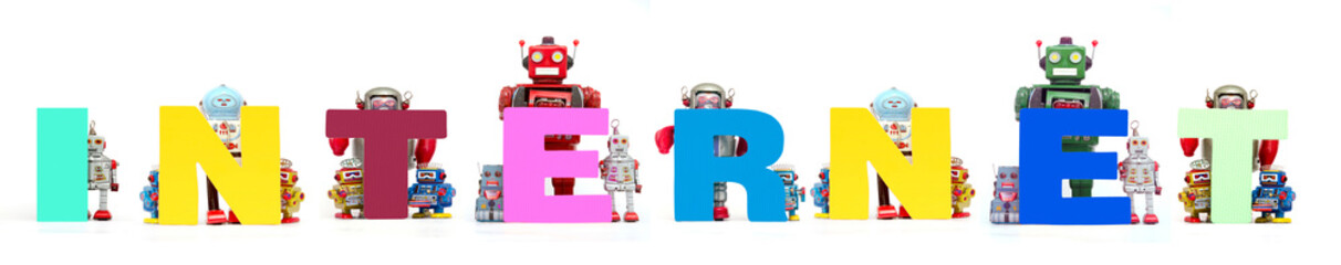 retro tin robot toys hold up the word   INTERNET