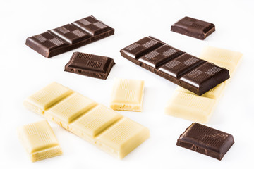 Black and white chocolate bars isolated on white background