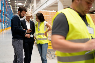 Managers visit warehouse