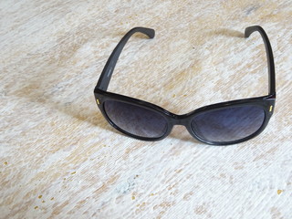 Black glasses on a light table