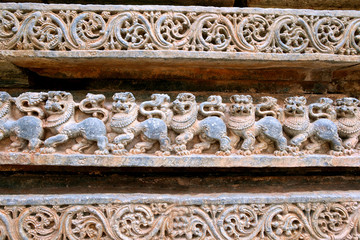 Friezes of Lions at the base of temple, Kedareshwara temple, Halebidu, Karnataka. Lion is the symbol of Hoysla Dinesty.