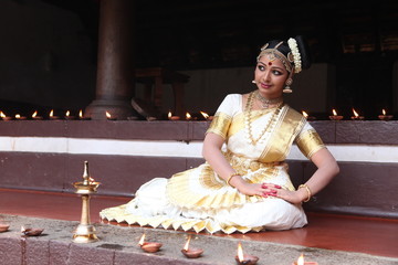 mohiniyattam or dance of enchantress is one of the classical dance forms of india,from the state of kerala.it is distinct for the costume and graceful body movements © fotomagic