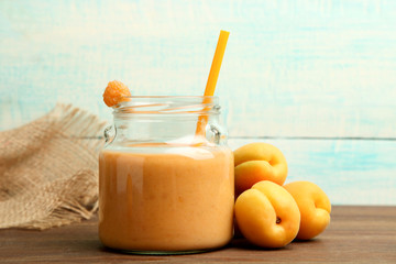 Apricot smoothies in a glass jar