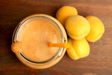 Apricot smoothies in a glass jar