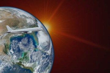 An aircraft flying on earth.Elements of this image furnished by NASA.