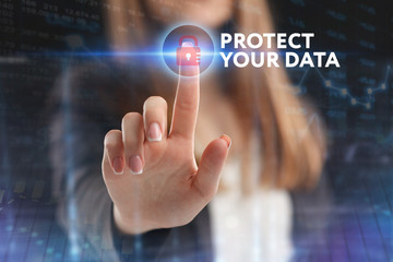 The concept of business, technology, the Internet and the network. A young entrepreneur working on a virtual screen of the future and sees the inscription: Protect your data