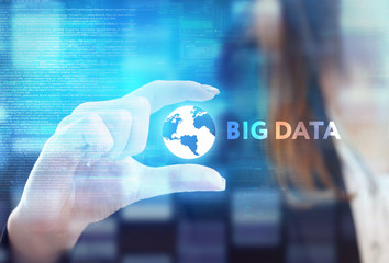 The concept of business, technology, the Internet and the network. A young entrepreneur working on a virtual screen of the future and sees the inscription: Big data