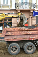Excavator used to dig up tree-stumps and roots