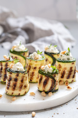 Grilled zucchini rolls stuffed with cream cheese